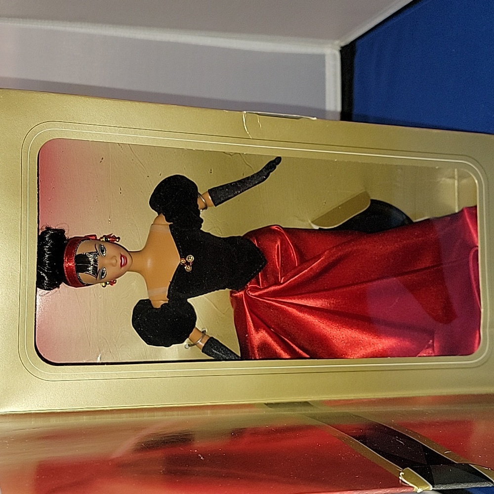 Barbie Avon Winter Spendor Barbie Doll in Red and Black Gown